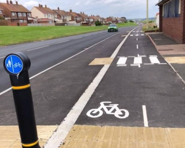 A South Shields woman has called on South Tyneside Council to explain why pedestrians have been placed next to the road as part of the new cycleway.