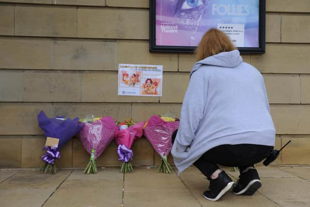 A Customs House colleague pays tribute to Karen Ratcliffe by leaving flowers outside of arts venue in South Shields.