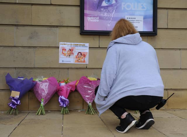 A Customs House colleague pays tribute to Karen Ratcliffe by leaving flowers outside of arts venue in South Shields.
