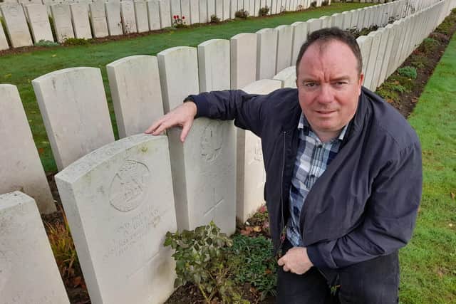Private Lawrence Gillan's grave, where he has lain since 1915, receives a first ever visitor; great-nephew and Gazette reporter Tony Gillan. Picture by Bethan Gillan.