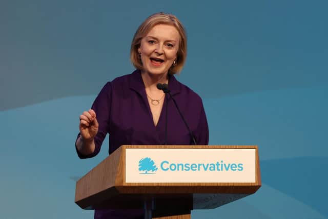 New Conservative Party leader and Britain's Prime Minister-elect Liz Truss delivers her victory speech as it was confirmed she would become the UK's third female prime minister following Theresa May and Margaret Thatcher.