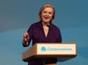 New Conservative Party leader and Britain's Prime Minister-elect Liz Truss delivers her victory speech as it was confirmed she would become the UK's third female prime minister following Theresa May and Margaret Thatcher.