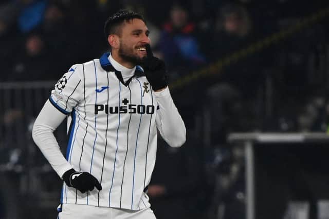 Atalanta's Argentine defender Jose Luis Palomino celebrates after scoring his team's second goal during the UEFA Champions League group F football match between BSC Young Boys and Atalanta BC at Stadion Wankdorf in Bern on November 23, 2021. (Photo by Fabrice COFFRINI / AFP) (Photo by FABRICE COFFRINI/AFP via Getty Images)