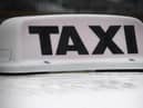 File picture of a taxi sign