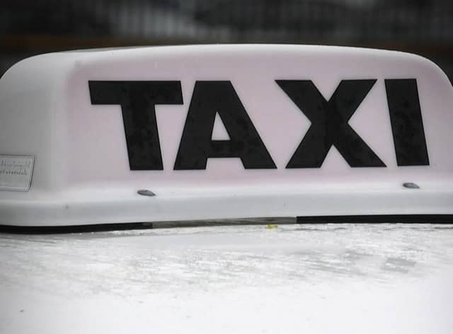 File picture of a taxi sign