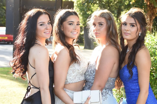 Year 11 girls strike a pose for the camera ahead of their end of year prom.