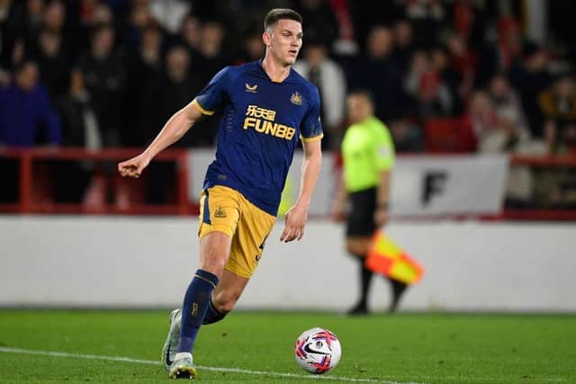 Newcastle United's Dutch defender Sven Botman runs with the ball during the English Premier League football match between Nottingham Forest and Newcastle United at The City Ground in Nottingham, central England, on March 17, 2023. (Photo by Oli SCARFF / AFP)