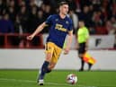 Newcastle United's Dutch defender Sven Botman runs with the ball during the English Premier League football match between Nottingham Forest and Newcastle United at The City Ground in Nottingham, central England, on March 17, 2023. (Photo by Oli SCARFF / AFP)