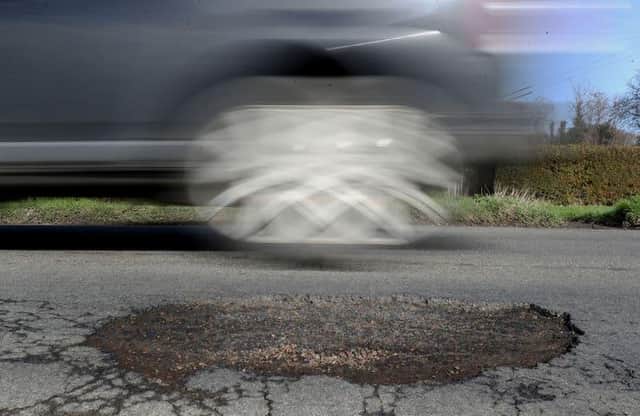Crumbling roads action call
