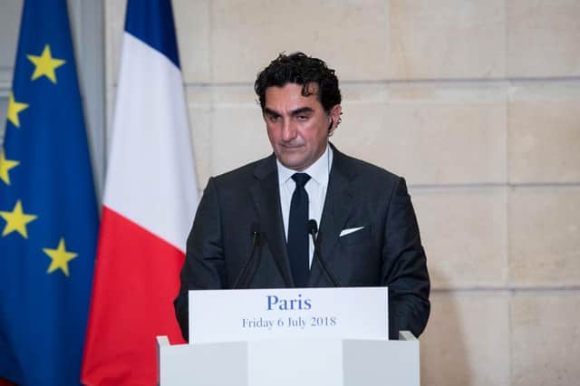 Saudi Arabia's Yasir Al-Rumayyan, the Managing Director of the Public Investment Fund gives a joint press conference on the Sovereign Health Funds program to fight climate change at the Elysee Palace, in Paris, on July 6, 2018. - Six sovereign wealth funds from Norway, United Arab Emirates, Saudi Arabia, Qatar, Kuwait and New Zealand released a joint framework on July 6, 2018 to encourage investors to take climate-related risks into consideration when investing. (Photo by Kamil Zihnioglu / POOL / AFP)        (Photo credit should read KAMIL ZIHNIOGLU/AFP via Getty Images)