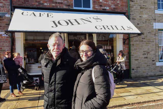 Bob Lear, 75, and grandaughter Laura Stavers, 30,  outside John's Cafe on the 1950's street at Beamish Museum.