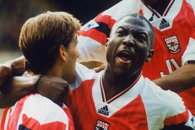 Kevin Campell (right) and Tony Adams of Arsenal FC. (Photo by Rob Gallagher/Hulton Archive/Getty Images)