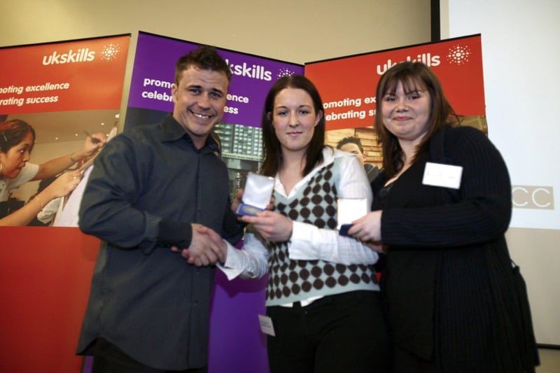 Big Brother winner Craig Philips presenting awards at Chesterfield College to Louise Buttery and Rachel Lampard in 2005