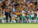 Allan Saint-Maximin of Newcastle United celebrates with team mates and manager, Eddie Howe after scoring their team's first goal  during the Premier League match between Wolverhampton Wanderers and Newcastle United at Molineux on August 28, 2022 in Wolverhampton, England. (Photo by David Rogers/Getty Images)