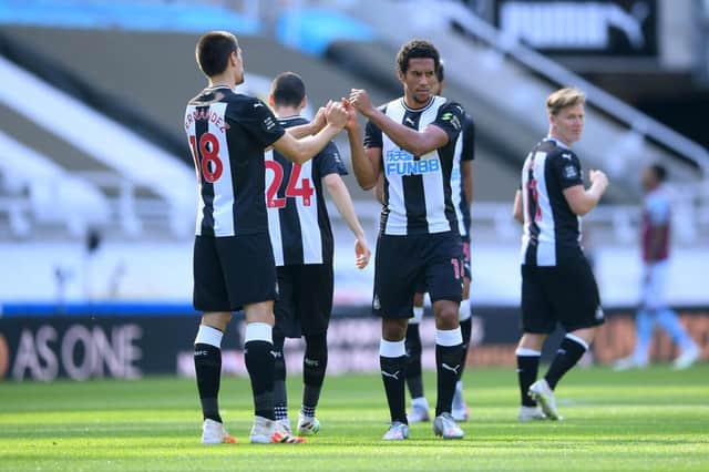 NEWCASTLE UPON TYNE, ENGLAND - JUNE 24: Federico Fernandez and Isaac Hayden of Newcastle United prepare for the match prior to the Premier League match between Newcastle United and Aston Villa at St. James Park on June 24, 2020 in Newcastle upon Tyne, United Kingdom. (Photo by Laurence Griffiths/Getty Images)