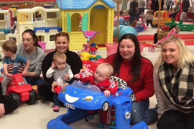 Young mums enjoy a day out before the coronavirus lockdown.