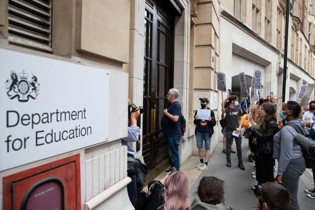 Sixth form students protest against the downgrading of A-level results on August 14, 2020 in London, England. (Photo by John Phillips/Getty Images)