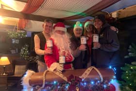 Carl Mowatt and Santa Claus with the Hebburn Helps team Jo Durkin, Angi Comerford, Alison Wilson
