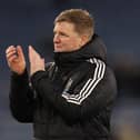 Newcastle United's English head coach Eddie Howe applauds fans on the pitch after the English Premier League football match between Leicester City and Newcastle United at King Power Stadium in Leicester, central England on April 7, 2025. Newcastle won the game 3-0. (Photo by Darren Staples / AFP)