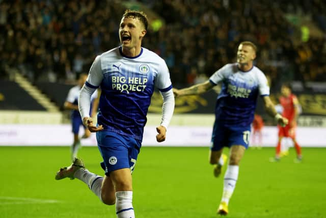 WIGAN, ENGLAND - OCTOBER 11: Nathan Broadhead of Wigan Athletic celebrates after scoring their sides first goal during the Sky Bet Championship between Wigan Athletic and Blackburn Rovers at DW Stadium on October 11, 2022 in Wigan, England. (Photo by Clive Brunskill/Getty Images)