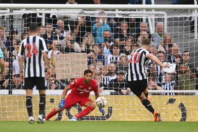 Chris Wood opened the scoring for Newcastle United against Atalanta (Photo by Stu Forster/Getty Images)