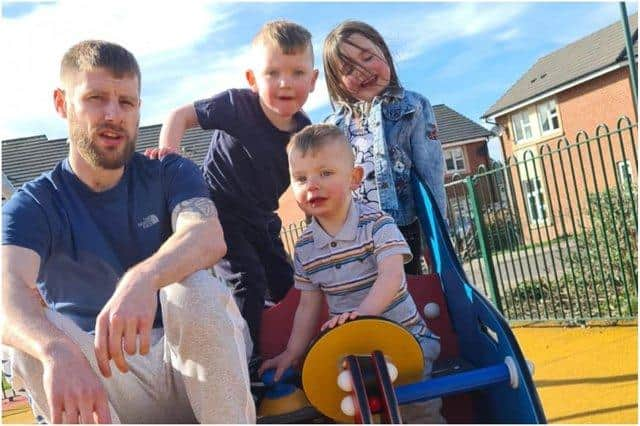 Robbie with step-dad Corey Wilson and siblings Alfie and Ava.