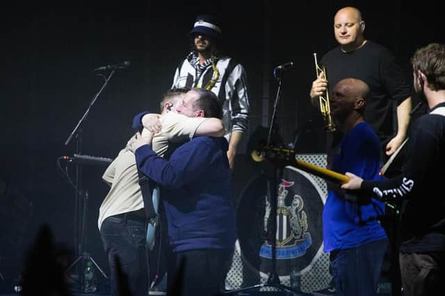 Sam Fender welcomed charity founder Brian Burridge on stage. Photo by Josh Bewick.