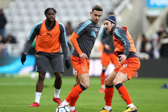 Olly Lee warms up at St James's Park while playing for Luton Town in January 2018.