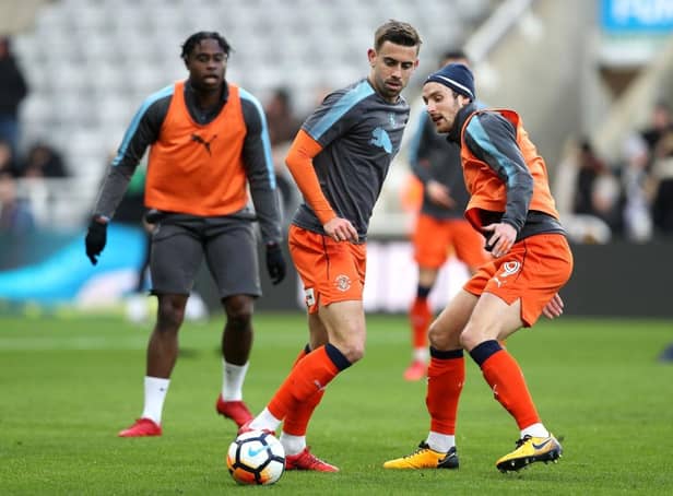 Olly Lee warms up at St James's Park while playing for Luton Town in January 2018.