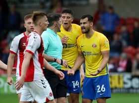 Bailey Wright remonstrates after a late penalty is awarded to Fleetwood