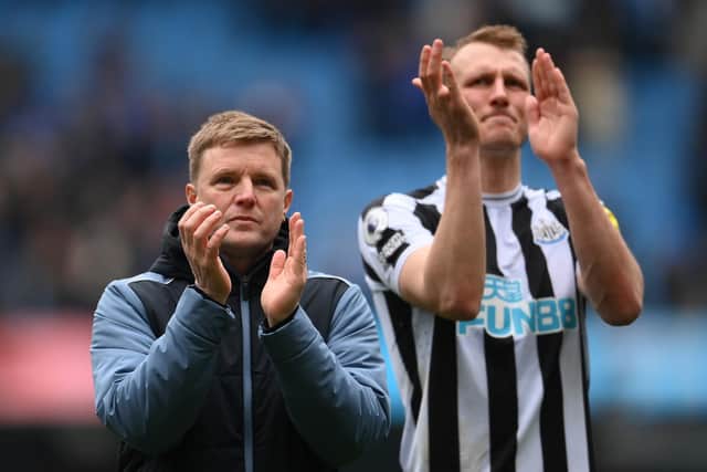 MANCHESTER, ENGLAND - MARCH 04: Eddie Howe, Manager of Newcastle United, applauds fans following the Premier League match between Manchester City and Newcastle United at Etihad Stadium on March 04, 2023 in Manchester, England. (Photo by Laurence Griffiths/Getty Images)