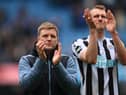 MANCHESTER, ENGLAND - MARCH 04: Eddie Howe, Manager of Newcastle United, applauds fans following the Premier League match between Manchester City and Newcastle United at Etihad Stadium on March 04, 2023 in Manchester, England. (Photo by Laurence Griffiths/Getty Images)