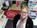 Madeline Duncan at the new Post Office counter inside of Duncan's News Hub.