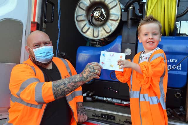 Robbie Plewa, four, with Steve Green of Northumbrian Water who paid him a surprise visit.