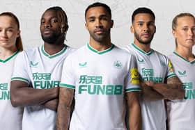 Newcastle United's green and white third kit.