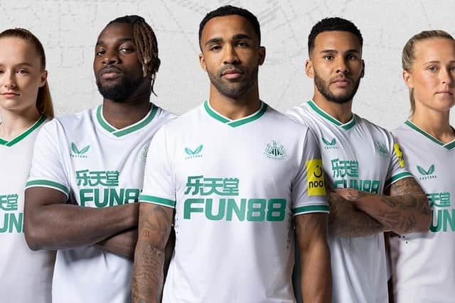 Newcastle United's green and white third kit.