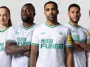 Newcastle United's green and white third kit.