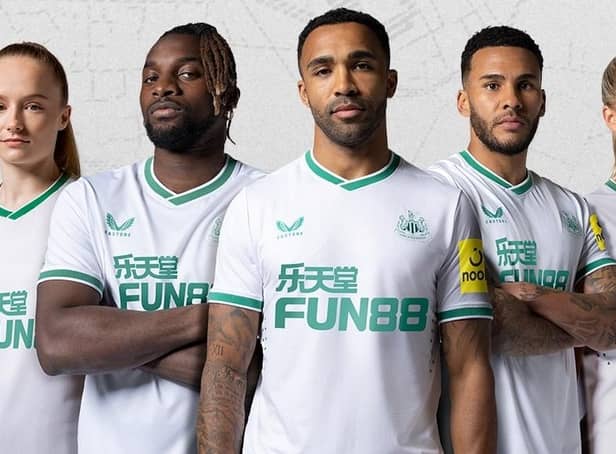 Newcastle United's green and white third kit.
