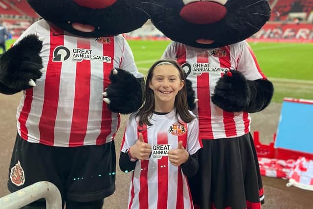 She got to meet the big mascots, too