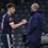 Scotland manager Steve Clarke interacts with Kieran Tierney of Scotland as he leaves the field during the FIFA World Cup 2022 Qatar qualifying match between Scotland and Faroe Islands on March 31, 2021 in Glasgow, Scotland.