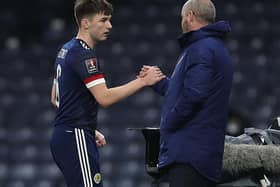 Scotland manager Steve Clarke interacts with Kieran Tierney of Scotland as he leaves the field during the FIFA World Cup 2022 Qatar qualifying match between Scotland and Faroe Islands on March 31, 2021 in Glasgow, Scotland.