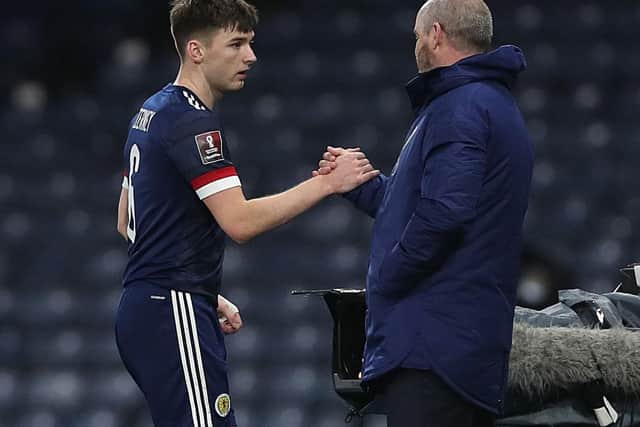 Scotland manager Steve Clarke interacts with Kieran Tierney of Scotland as he leaves the field during the FIFA World Cup 2022 Qatar qualifying match between Scotland and Faroe Islands on March 31, 2021 in Glasgow, Scotland.
