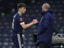 Scotland manager Steve Clarke interacts with Kieran Tierney of Scotland as he leaves the field during the FIFA World Cup 2022 Qatar qualifying match between Scotland and Faroe Islands on March 31, 2021 in Glasgow, Scotland.