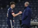 Scotland manager Steve Clarke interacts with Kieran Tierney of Scotland as he leaves the field during the FIFA World Cup 2022 Qatar qualifying match between Scotland and Faroe Islands on March 31, 2021 in Glasgow, Scotland.