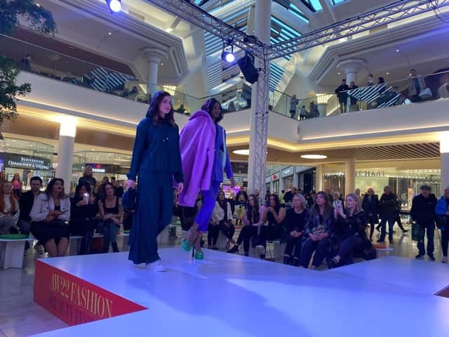 Shoppers can watch the live runway shows.