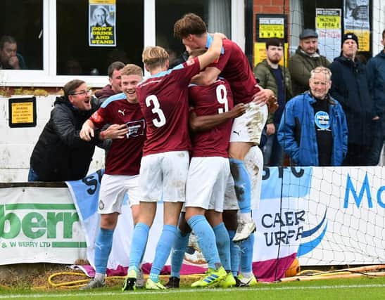 The South Shields players celebrate.