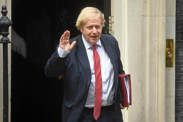 Prime Minister Boris Johnson leaves 10 Downing Street, London, for the House of Commons, ahead of his statement to the House on COVID-19. Photo: Kirsty O'Connor/PA Wire