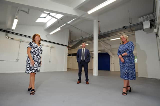 South Tyneside Council Cllr Mark Walsh with Jarrow Business Centre's Janice Stott, left, and Lisa Frost-Younger, and the new manufacturing units.