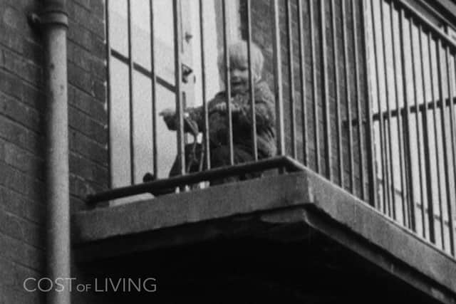 Playing on the balcony.