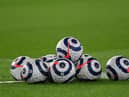 Premier League match balls. (Photo by Shaun Botterill/Getty Images)